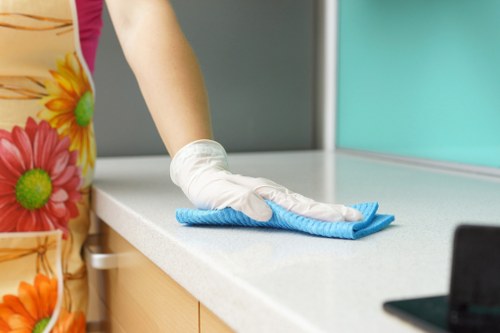 Spot cleaning a mattress stain with a cloth
